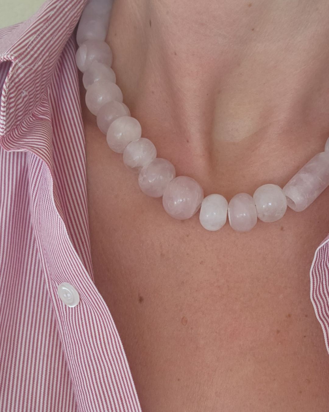 Complete pink Gemini amulet